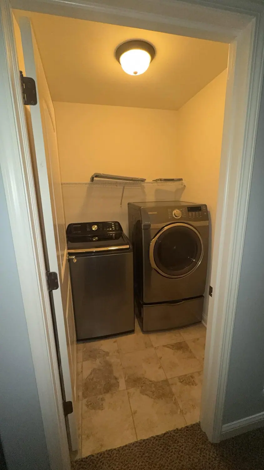Washer, dryer, and laundry room floor cleaned