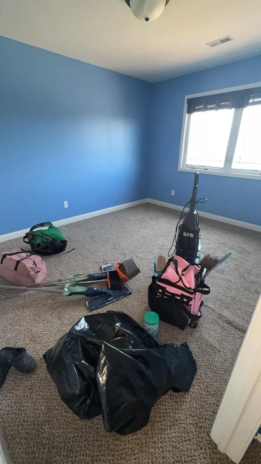 Cleaning caddies, vacuum, and supplies ready on site