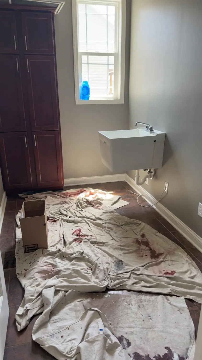 Drop cloth laid down while a bathroom is deep cleaned