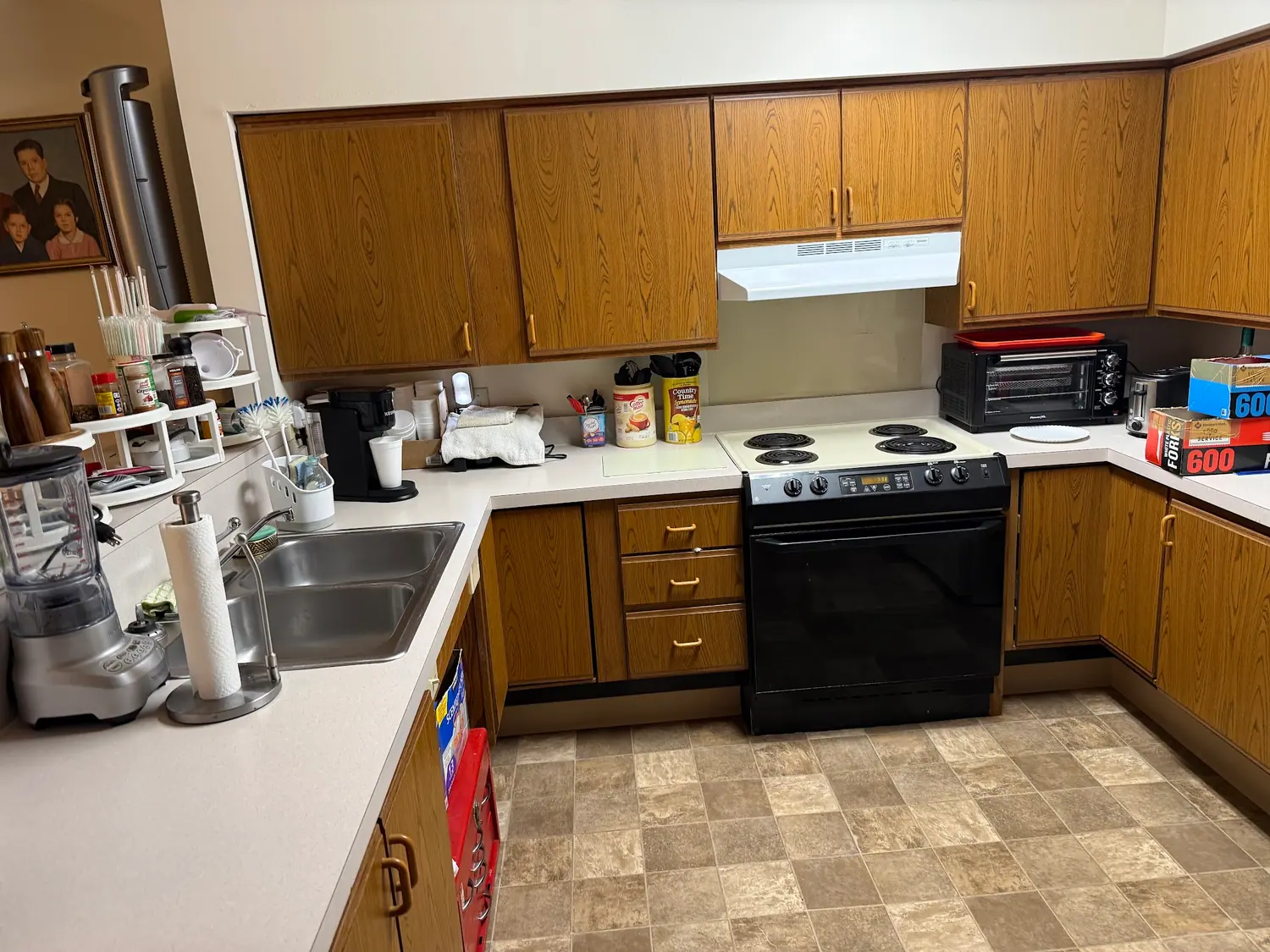 Oak kitchen counters, stove, and floor cleaned